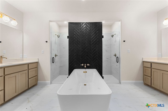 bathroom featuring vanity and separate shower and tub