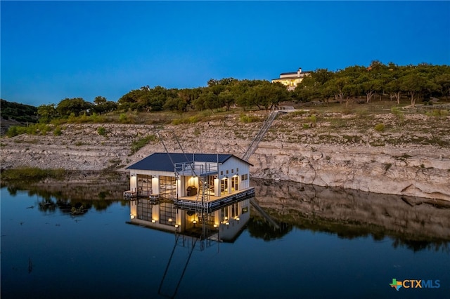 view of dock with a water view