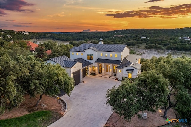 view of front of property featuring a garage