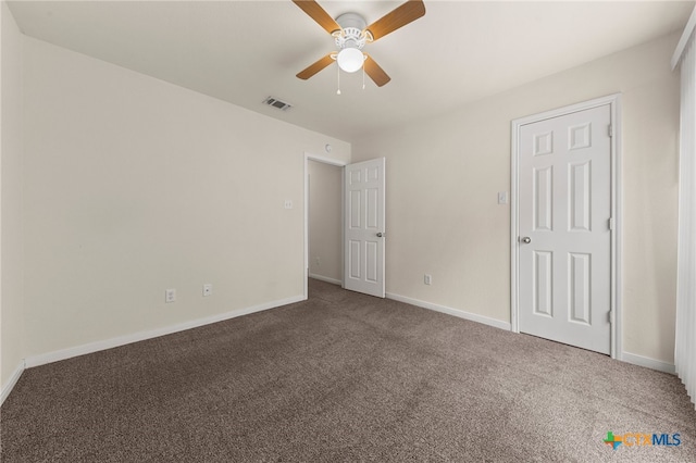 unfurnished bedroom featuring carpet flooring and ceiling fan