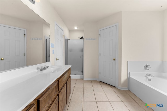 bathroom featuring tile patterned flooring, vanity, and independent shower and bath