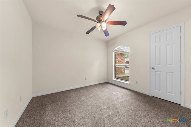 unfurnished room featuring carpet floors and ceiling fan