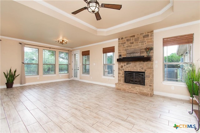 4360 Flint Oak Dr, Belton, TX 76513 - unfurnished living room featuring plenty of natural light, a ceiling fan, ornamental molding, and a raised ceiling
