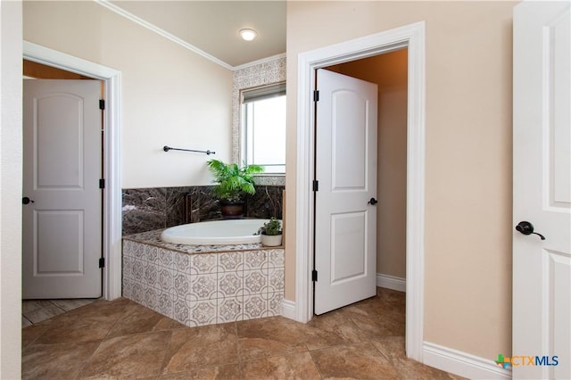 4360 Flint Oak Dr, Belton, TX 76513 - bathroom with crown molding, a bath, and tile patterned floors