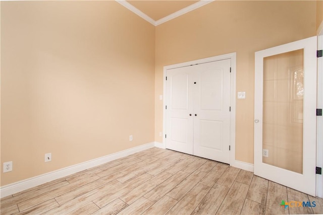 4360 Flint Oak Dr, Belton, TX 76513 - unfurnished room with crown molding, light wood finished floors, and baseboards