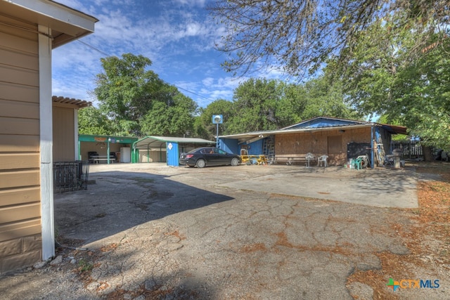 view of patio with a storage shed