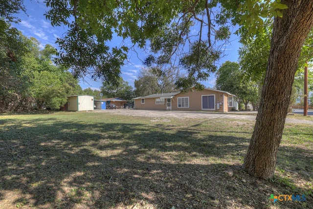 exterior space featuring a front lawn