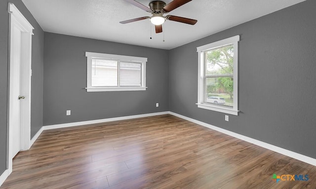 309 Fallen Leaf Ln, Temple, TX 76502 - spare room featuring wood finished floors and a ceiling fan