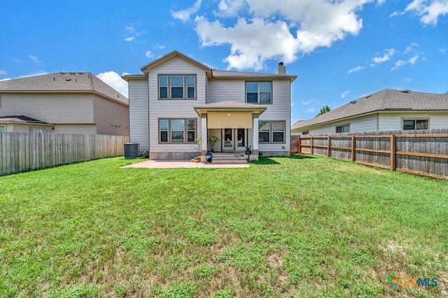309 Fallen Leaf Ln, Temple, TX 76502 - back of property featuring a patio, a chimney, and a fenced backyard