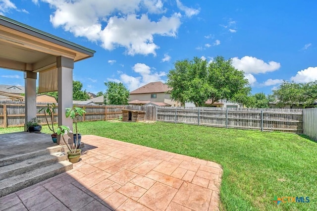309 Fallen Leaf Ln, Temple, TX 76502 - rear view of house featuring a patio area, a chimney, and a fenced backyard