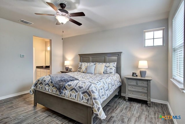 bedroom featuring ceiling fan and ensuite bathroom