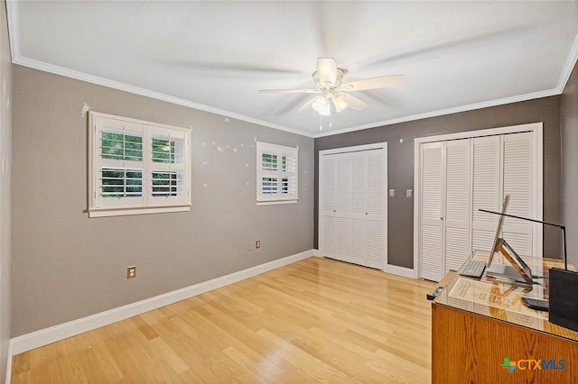801 Arrowhead Dr, Salado, TX 76571 - unfurnished office with ceiling fan, light wood finished floors, baseboards, and crown molding