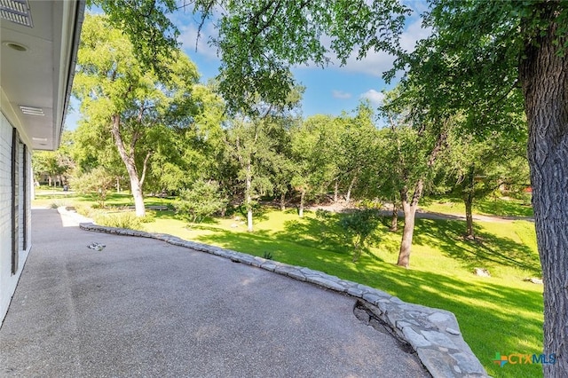 801 Arrowhead Dr, Salado, TX 76571 - view of patio featuring view of wooded area