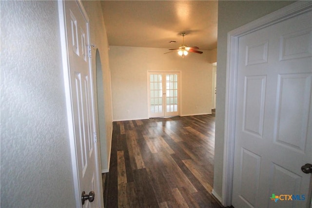 hall featuring french doors and dark hardwood / wood-style floors