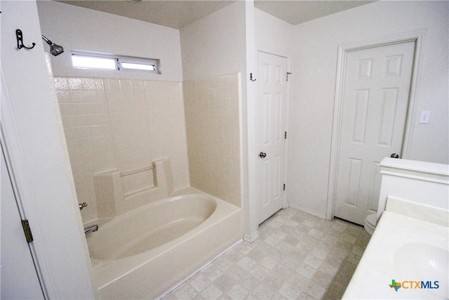 bathroom with shower / tub combination and toilet