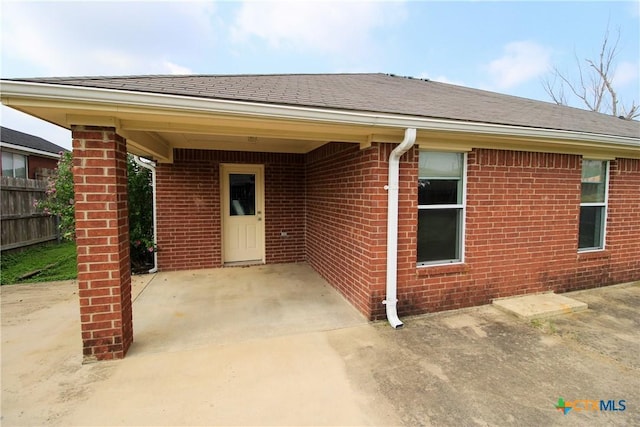 doorway to property featuring a patio area