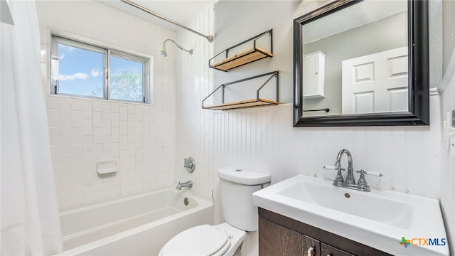 bathroom featuring shower / tub combination, toilet, and vanity
