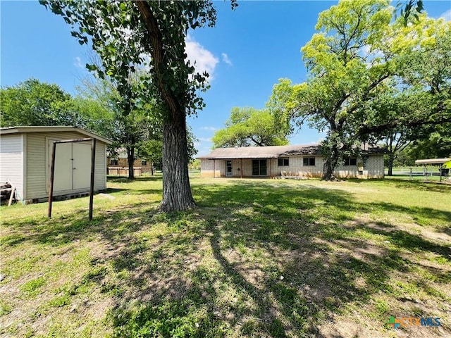 212 Brook St, Seguin, TX 78155 - view of yard with a storage shed