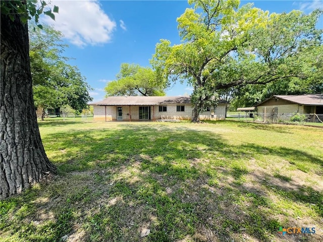 212 Brook St, Seguin, TX 78155 - back of property featuring brick siding