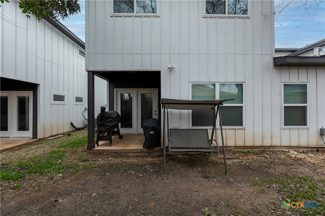 property entrance with board and batten siding