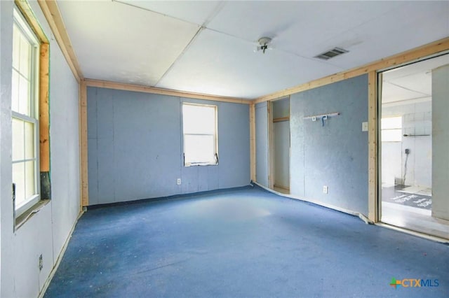 709 Burkett St, Taylor, TX 76574 - spare room featuring concrete flooring