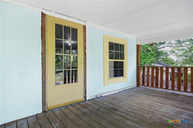 709 Burkett St, Taylor, TX 76574 - view of wooden porch