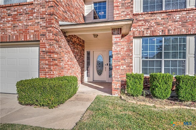 entrance to property with a garage