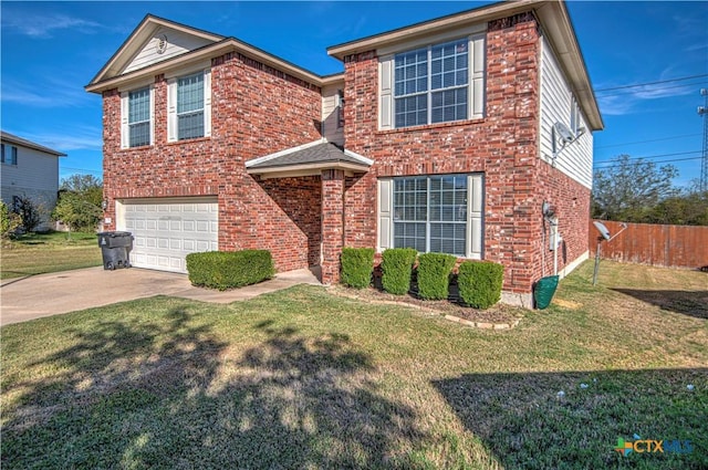 front of property featuring a garage and a front lawn