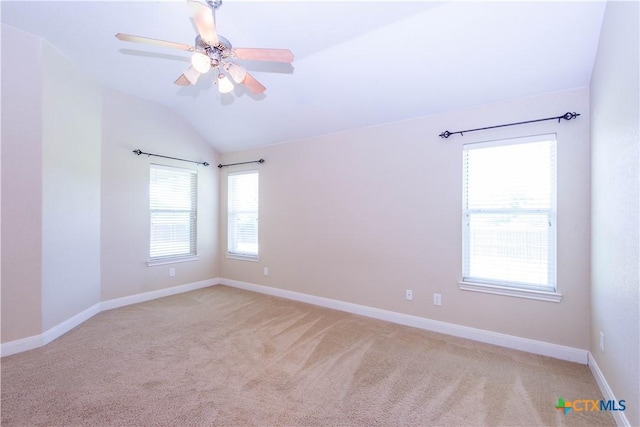 2210 Addax Trl, Harker Heights, TX 76548 - spare room featuring light colored carpet, vaulted ceiling, and a ceiling fan