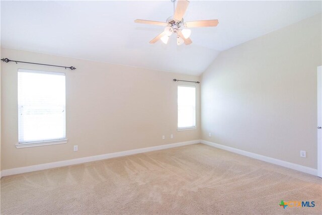 2210 Addax Trl, Harker Heights, TX 76548 - spare room with vaulted ceiling, light carpet, and a ceiling fan
