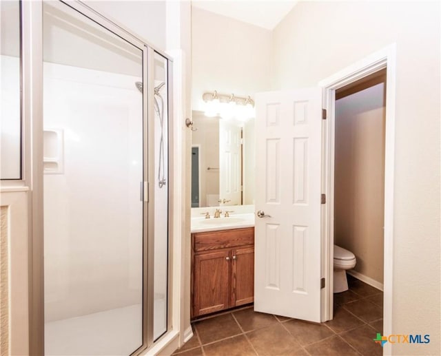 2210 Addax Trl, Harker Heights, TX 76548 - bathroom with a stall shower, vanity, and tile patterned flooring