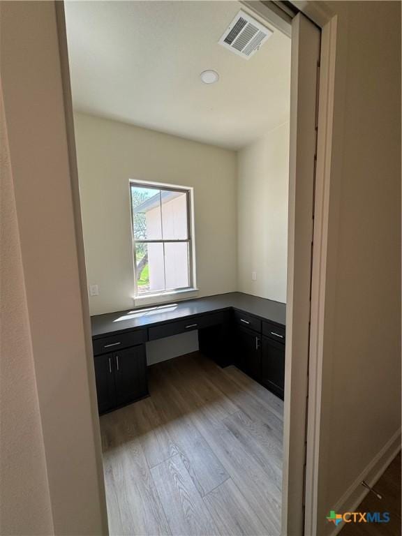 5903 Whippoorwill Rd, Temple, TX 76502 - unfurnished office with light wood-style floors and built in desk