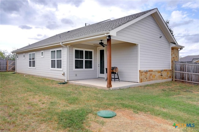 1512 Stonecrest Dr, Granite Shoals, TX 78654 - rear view of property with a patio, ceiling fan, roof with shingles, and stone siding