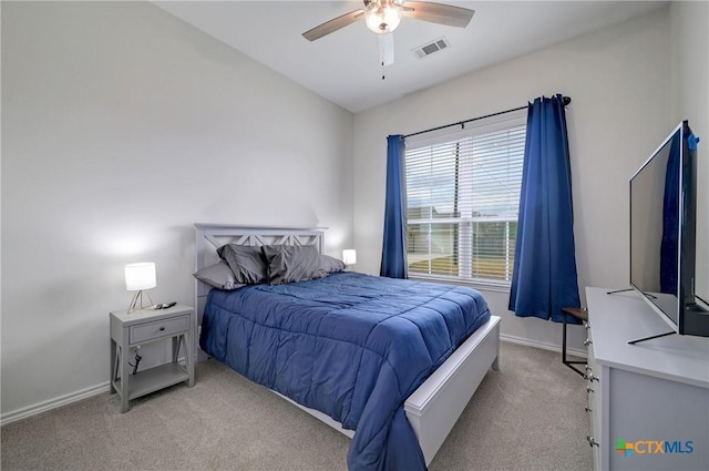 1512 Stonecrest Dr, Granite Shoals, TX 78654 - bedroom with light colored carpet, baseboards, and a ceiling fan