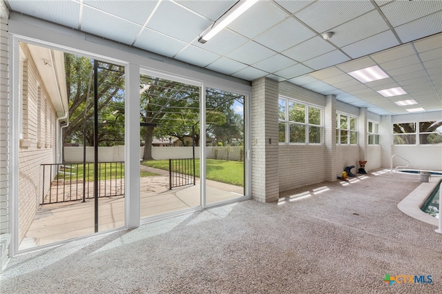 interior space with a drop ceiling