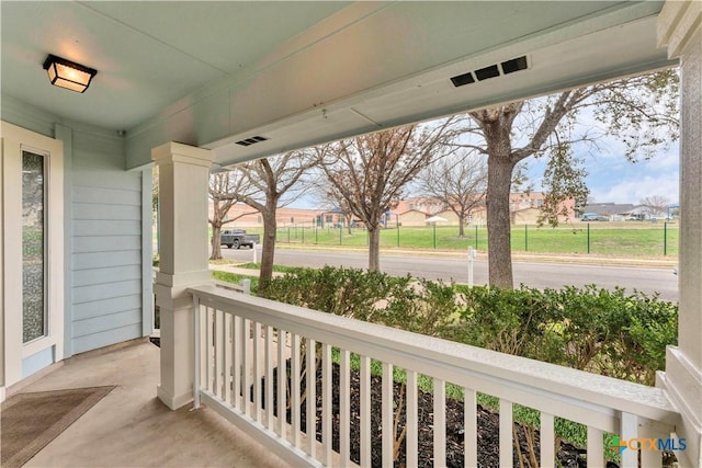 balcony featuring a porch