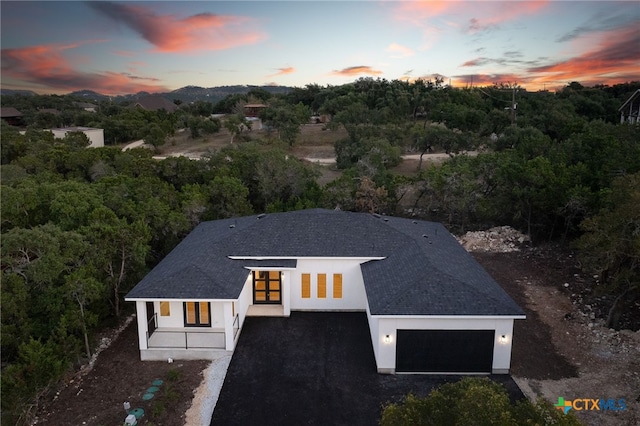 view of aerial view at dusk