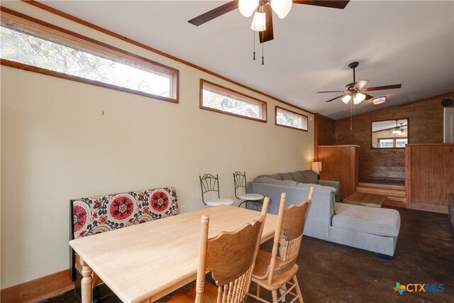 dining room with vaulted ceiling and ceiling fan