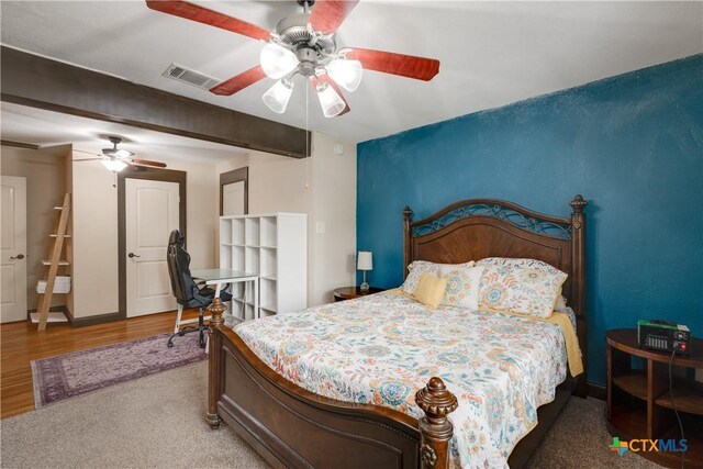 bedroom featuring ceiling fan and hardwood / wood-style floors