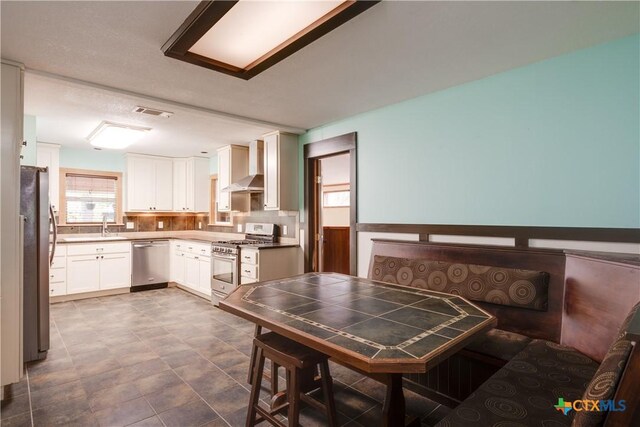 dining area featuring sink