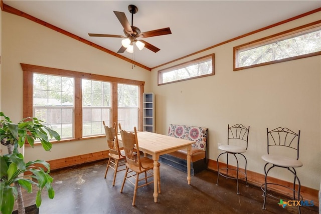 dining area featuring ceiling fan and vaulted ceiling