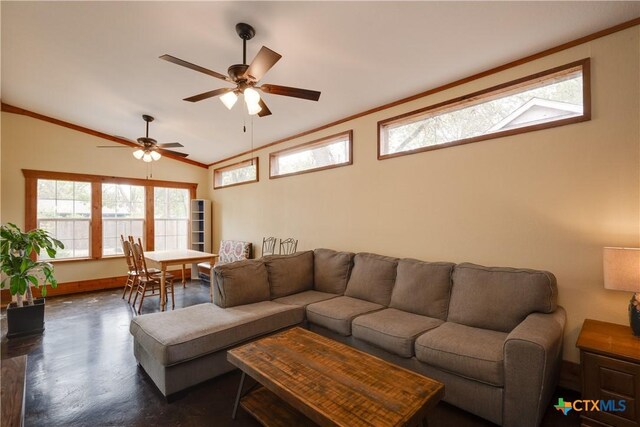 living room featuring ceiling fan, crown molding, dark hardwood / wood-style floors, and vaulted ceiling