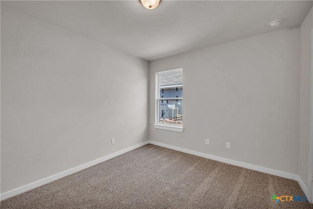 spare room with carpet flooring