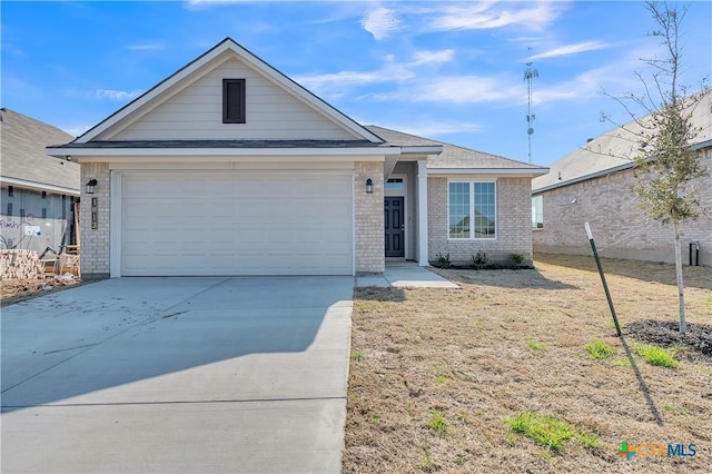 ranch-style home with a garage