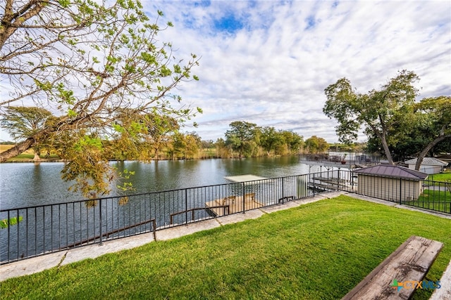 exterior space with a water view