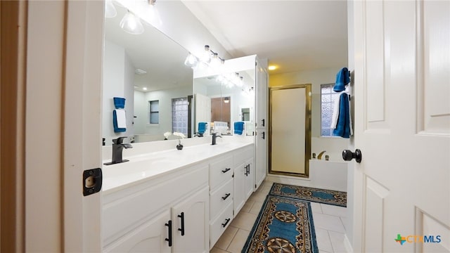 bathroom with vanity, tile patterned floors, and an enclosed shower