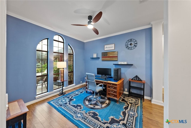 office with hardwood / wood-style flooring, ceiling fan, and crown molding