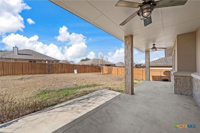 view of patio featuring ceiling fan