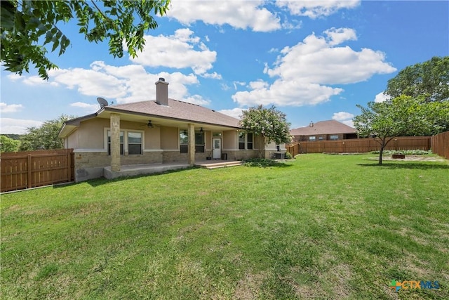 2515 Alpine Fir Dr, Harker Heights, TX 76548 - back of property with a ceiling fan, a fenced backyard, a patio area, a chimney, and stucco siding