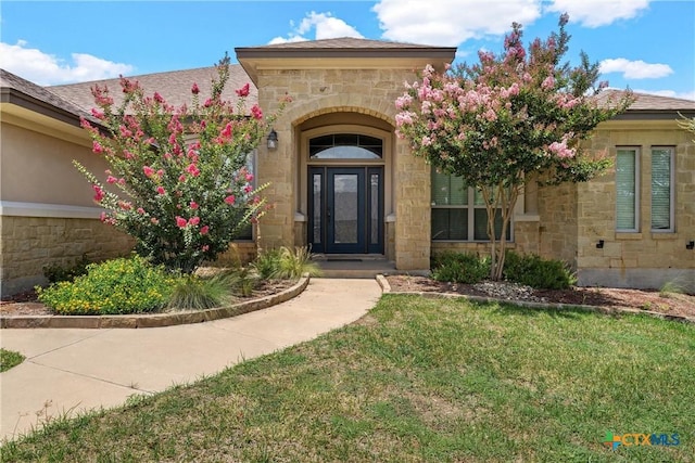 2515 Alpine Fir Dr, Harker Heights, TX 76548 - doorway to property featuring stone siding and a yard
